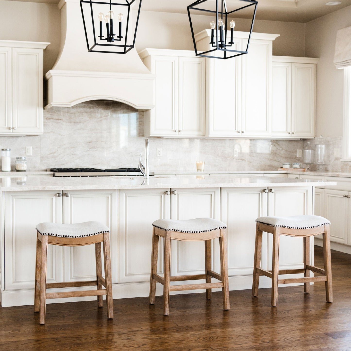 Maven Lane Adrien Saddle Bar Stool in Weathered Oak Finish w/ Sand Color Fabric Upholstery, Set of 2