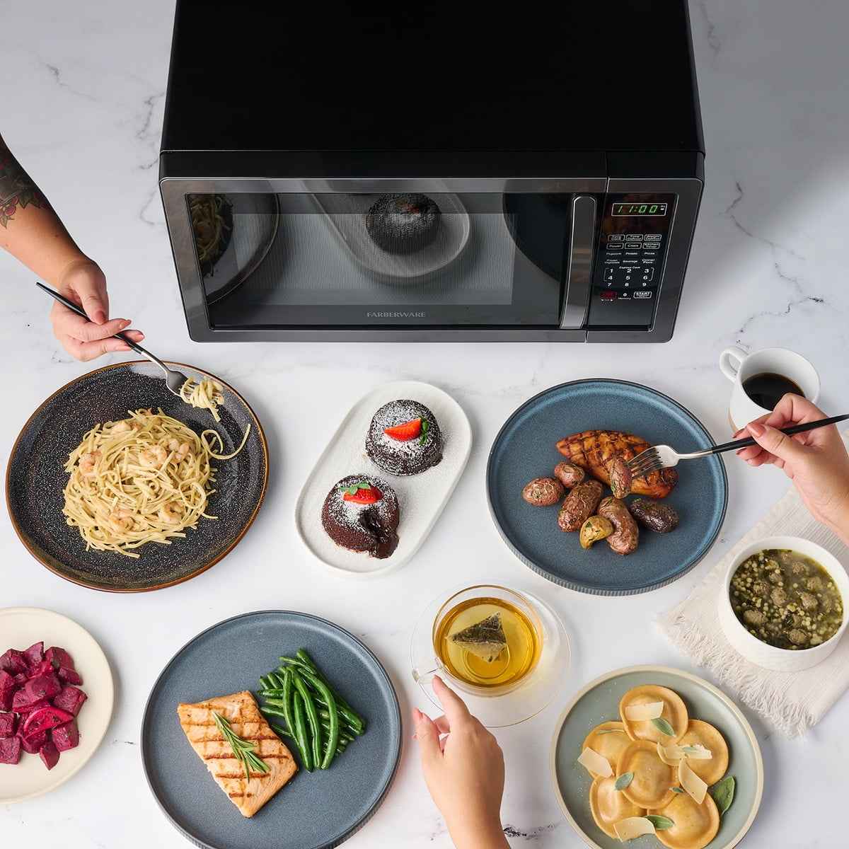 Farberware Stainless Steel Countertop Microwave Oven with Child Lock, 1.1 Cu Ft Black Stainless